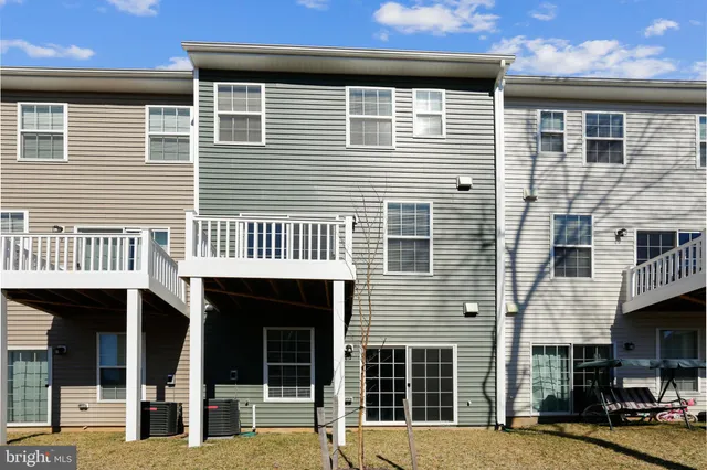 a front view of a house with a porch