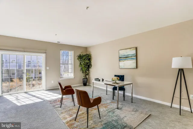 a workspace with furniture and a window