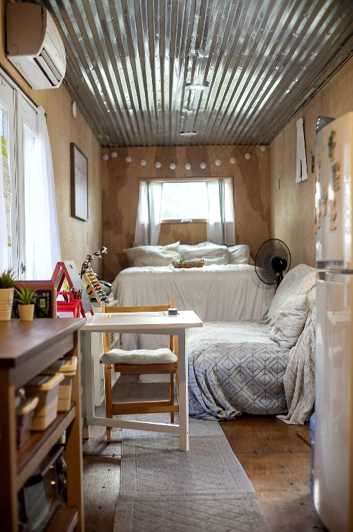 385 Country Lane Dripping Springs, TX 78620 - Photo 5 of 27 a bedroom with furniture and a window