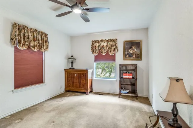a view of room with window and workspace