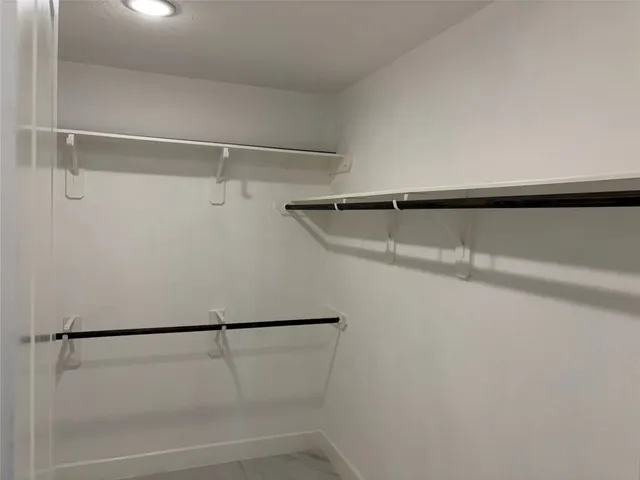 a view of a room with shelves