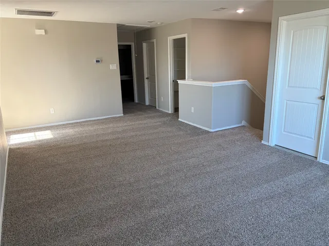 a view of a backyard with a garden