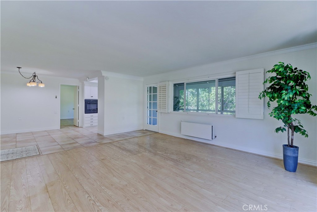 912 Ronda Sevilla, Unit O Laguna Woods, CA 92637 - Photo 10 of 55 a view of an empty room with a window
