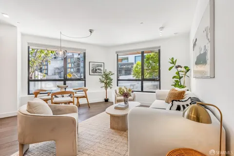a group of people sitting in a living room