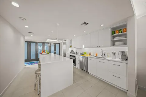 a kitchen with a sink and counter top space