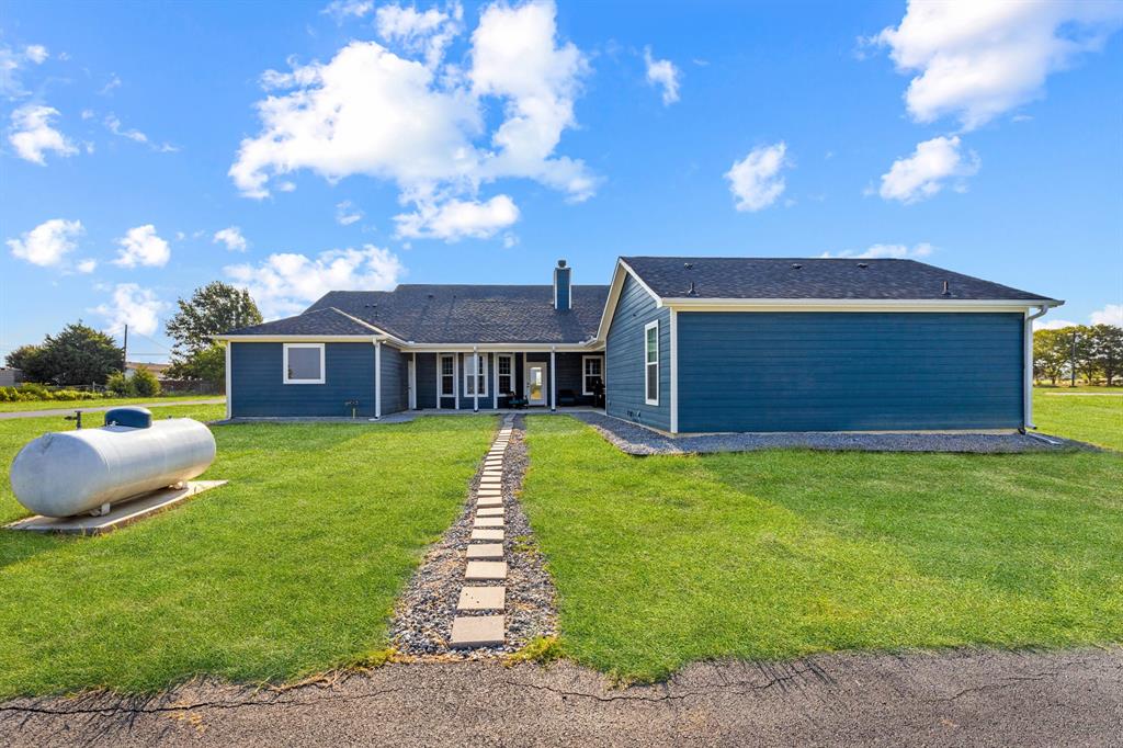 27084 Fm 47 Wills Point Wills Point, TX 75169 - Photo 11 of 36 a front view of a house with a garden