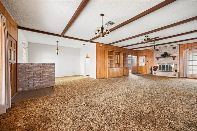 a white toilet sitting next to a shower curtain