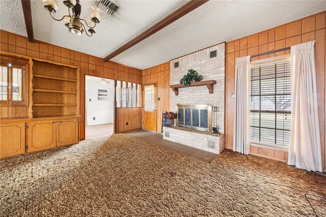 a view of an empty room and window