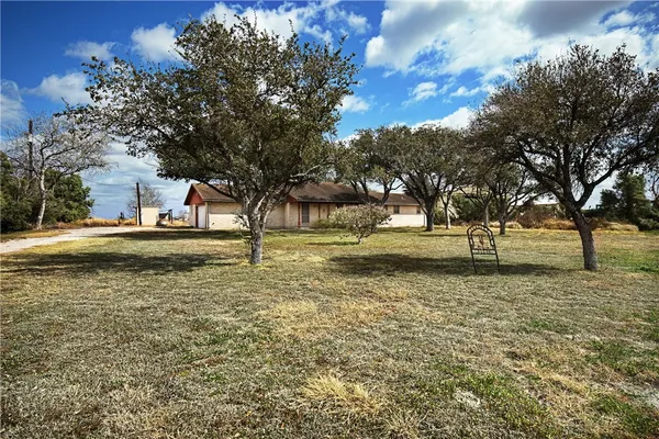 a front view of house with yard