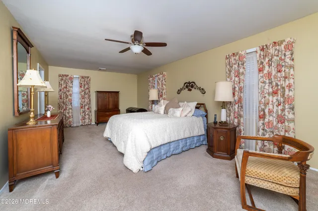 a bed room with a bed and a couch