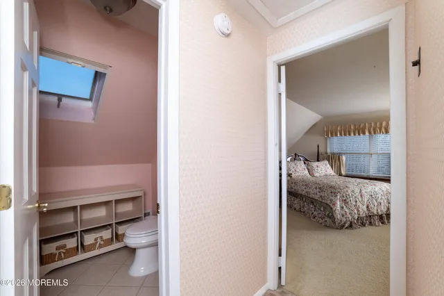 a view of a bedroom from a hallway