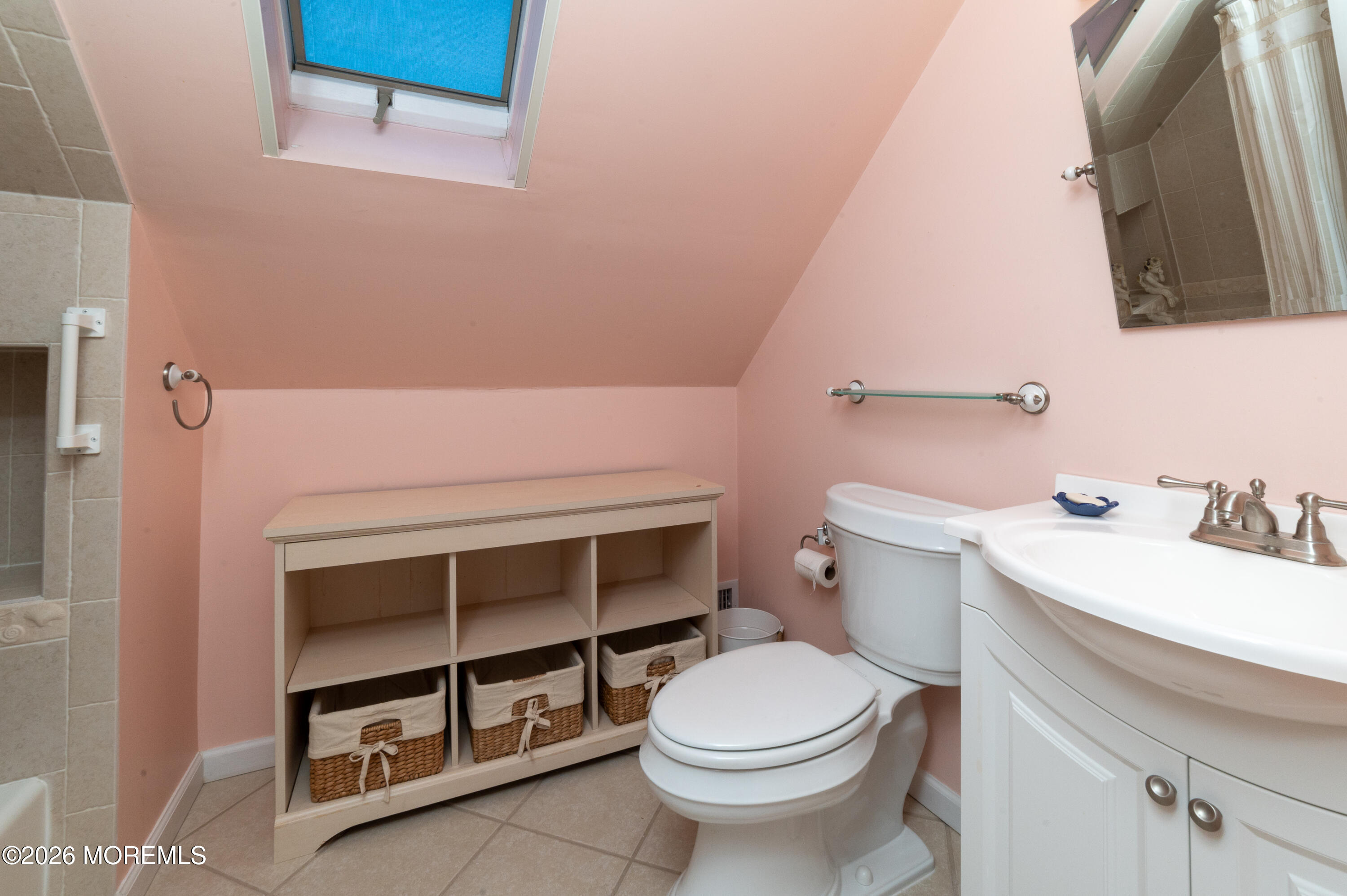 2 Brentwood Road Matawan, NJ 07747 - Photo 24 of 36 a bathroom with a sink a toilet and shower