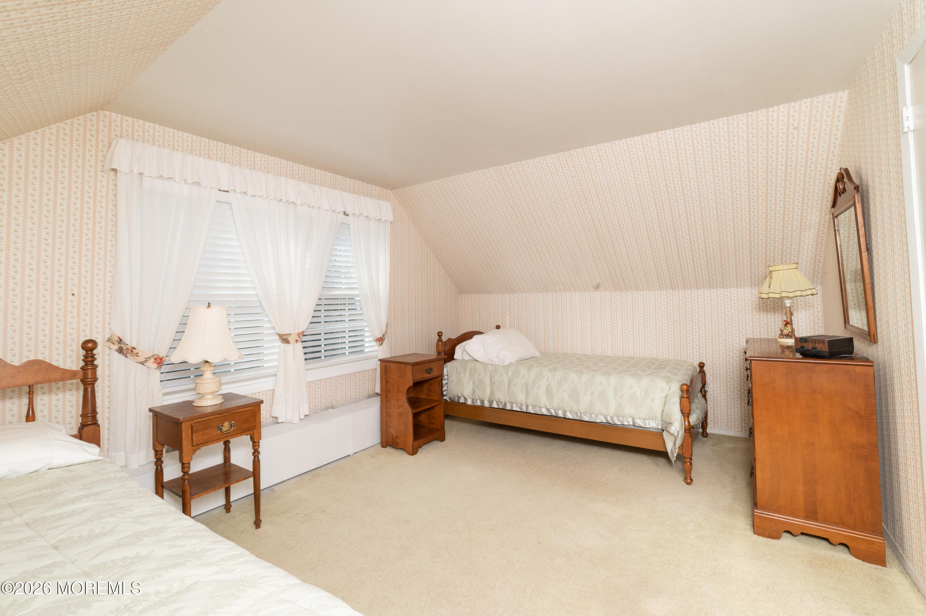 2 Brentwood Road Matawan, NJ 07747 - Photo 27 of 36 a bedroom with a bed and a dresser with mirror