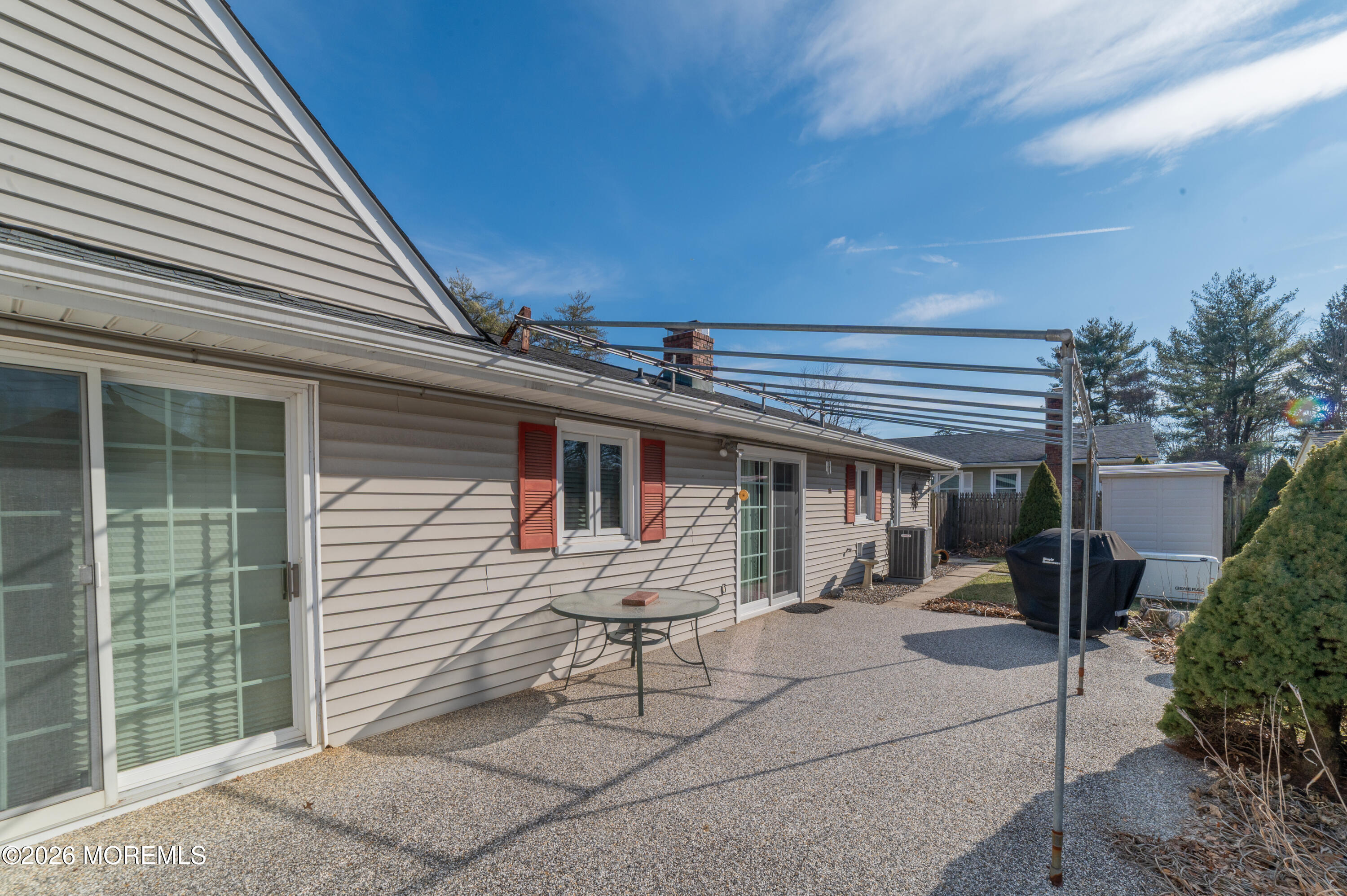 2 Brentwood Road Matawan, NJ 07747 - Photo 32 of 36 a front view of a house with a yard