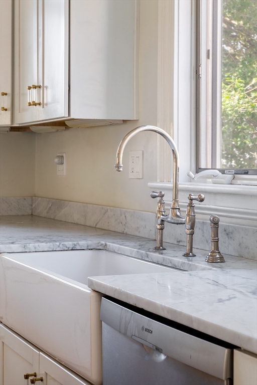 70 Oxford Street Somerville, MA 02143 - Photo 5 of 38 a close view of sink and tap