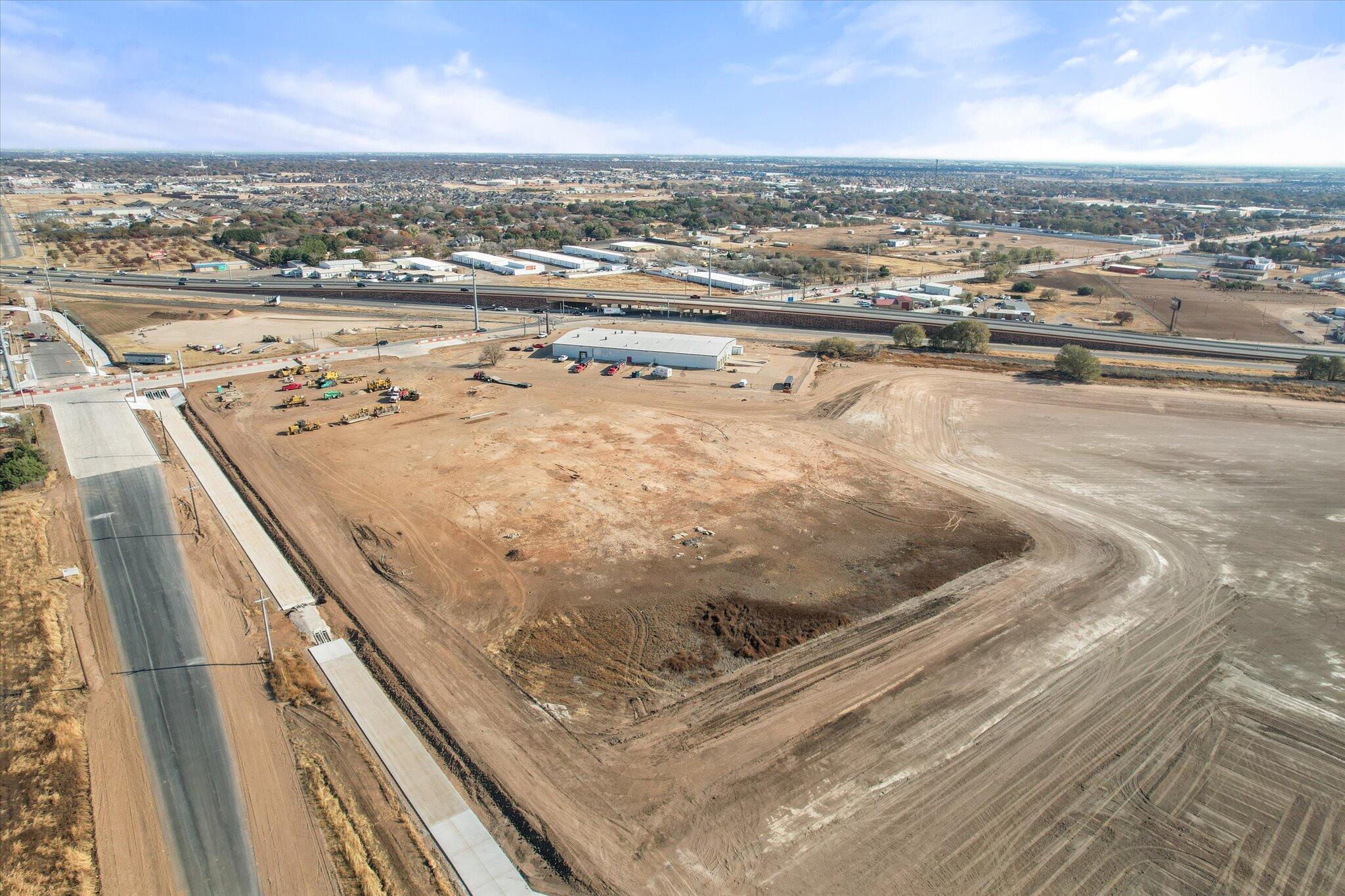 7401 66th Street Lubbock, TX 79407 - Photo 2 of 5 a view of a lake view