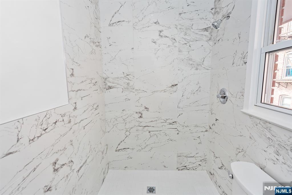 86 Chestnut Street, Unit 2 Rutherford, NJ 07070 - Photo 5 of 20 view of a bathroom with a shower