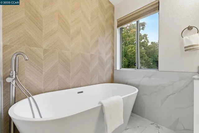 a bathroom with a bathtub