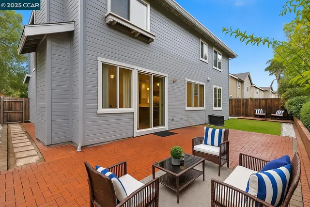 a front view of a house with patio