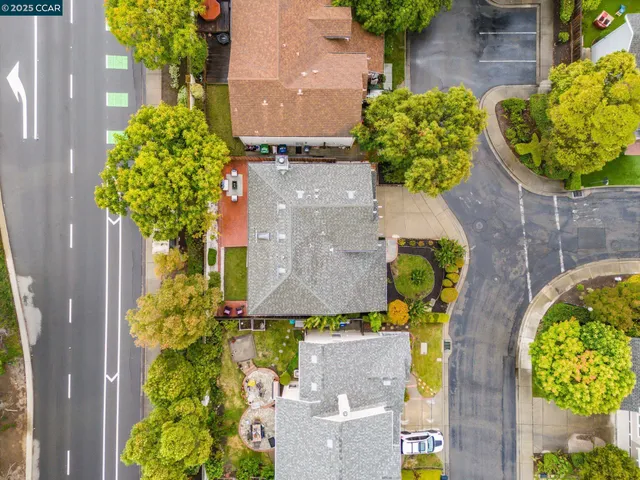front view of a house with a fountain