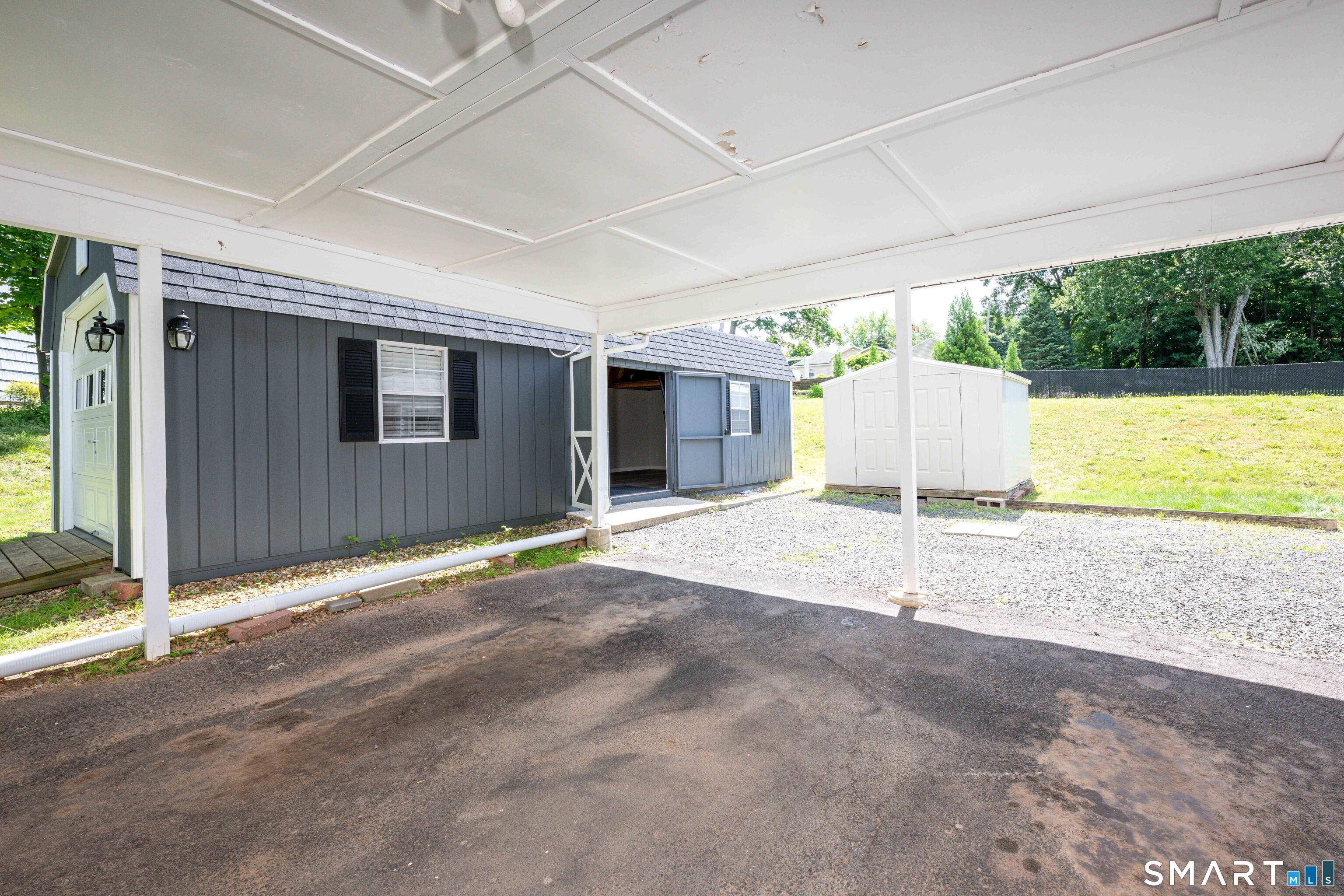91 Nicholas Road Wallingford, CT 06492 - Photo 28 of 31 Carport leading to Shed and Workshop