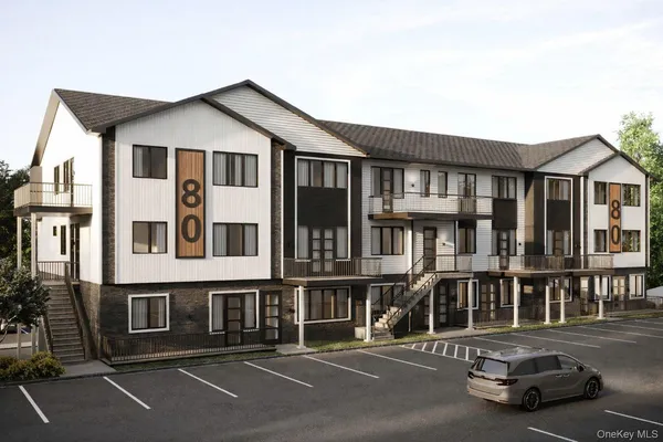 a car parked in front of a house