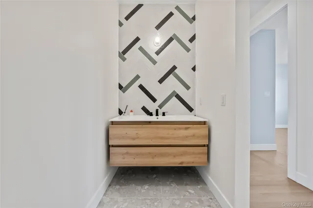 a bathroom with a bathtub and toilet