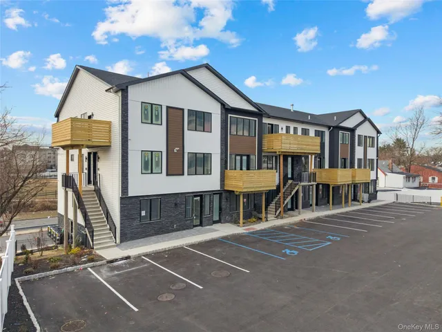 a view of swimming pool with an outdoor space and seating area