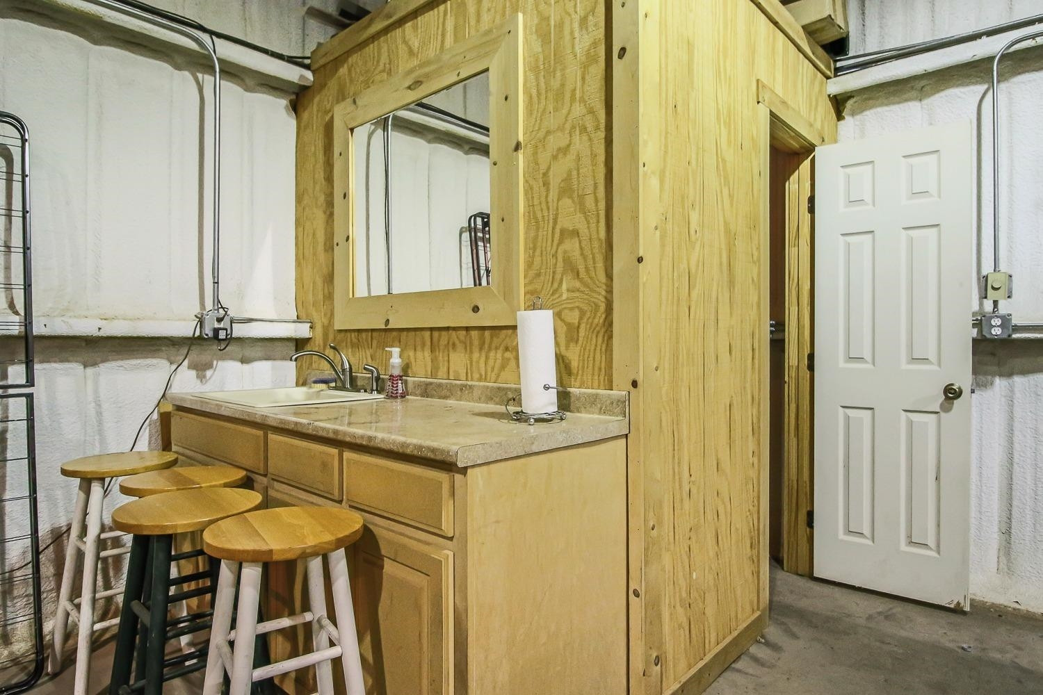 10218 Woodrow Road Ropesville, TX 79358 - Photo 12 of 41 Shop bathroom entrance/shop sink