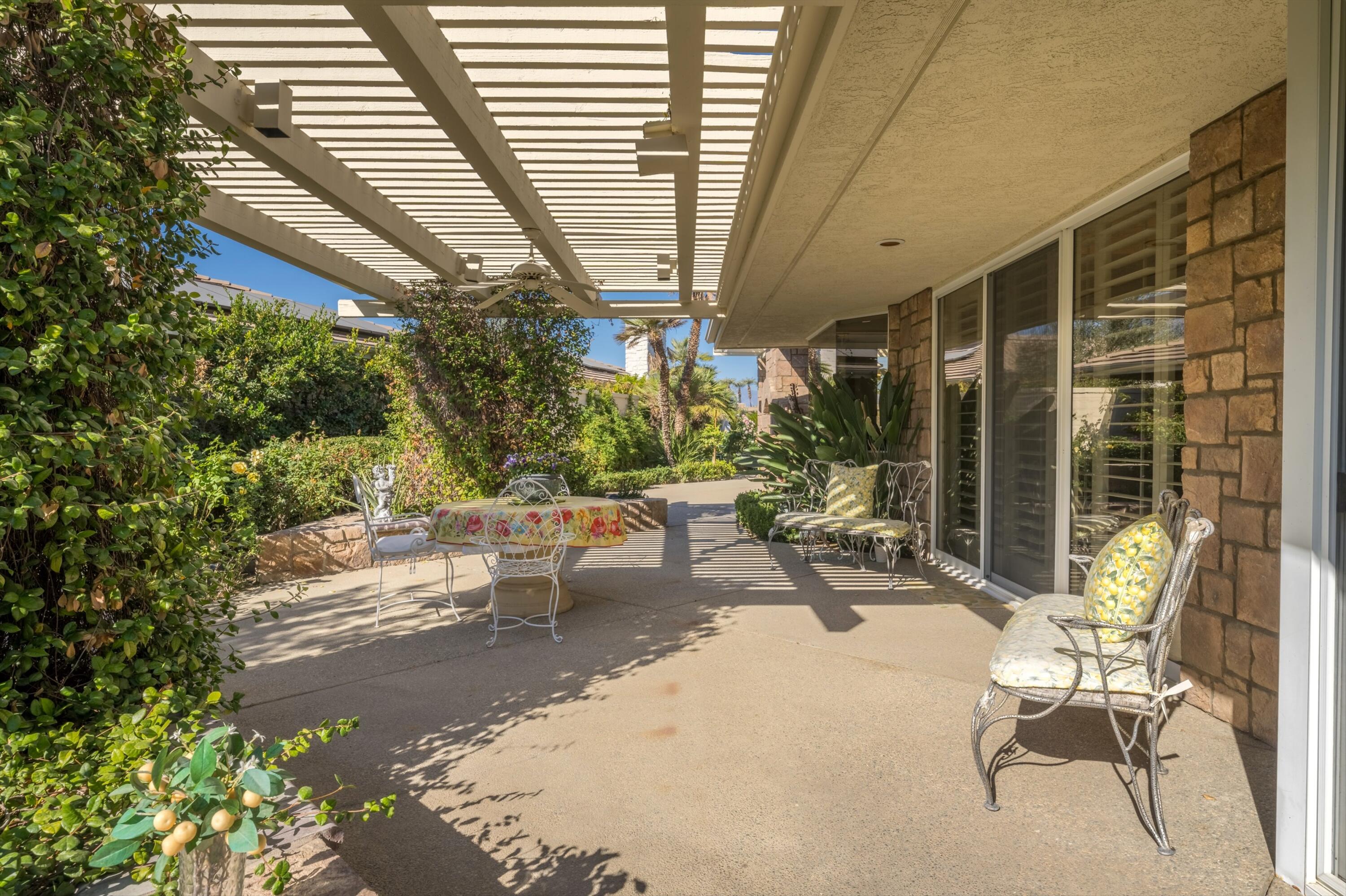 42 Fincher Way Rancho Mirage, CA 92270 - Photo 19 of 43 Side eating/lounging patio off kitchen