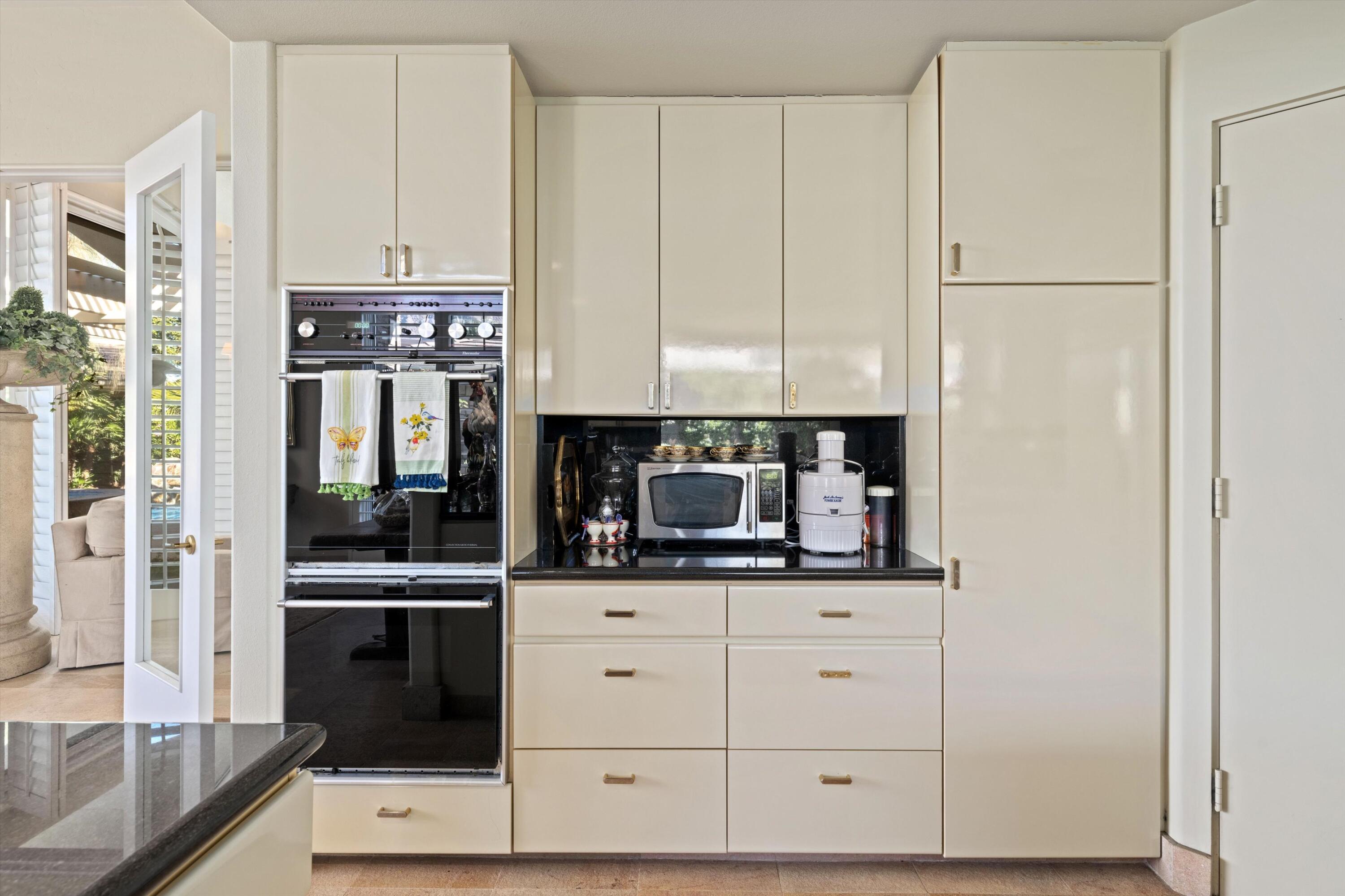 42 Fincher Way Rancho Mirage, CA 92270 - Photo 25 of 43 Double ovens, walk-in pantry