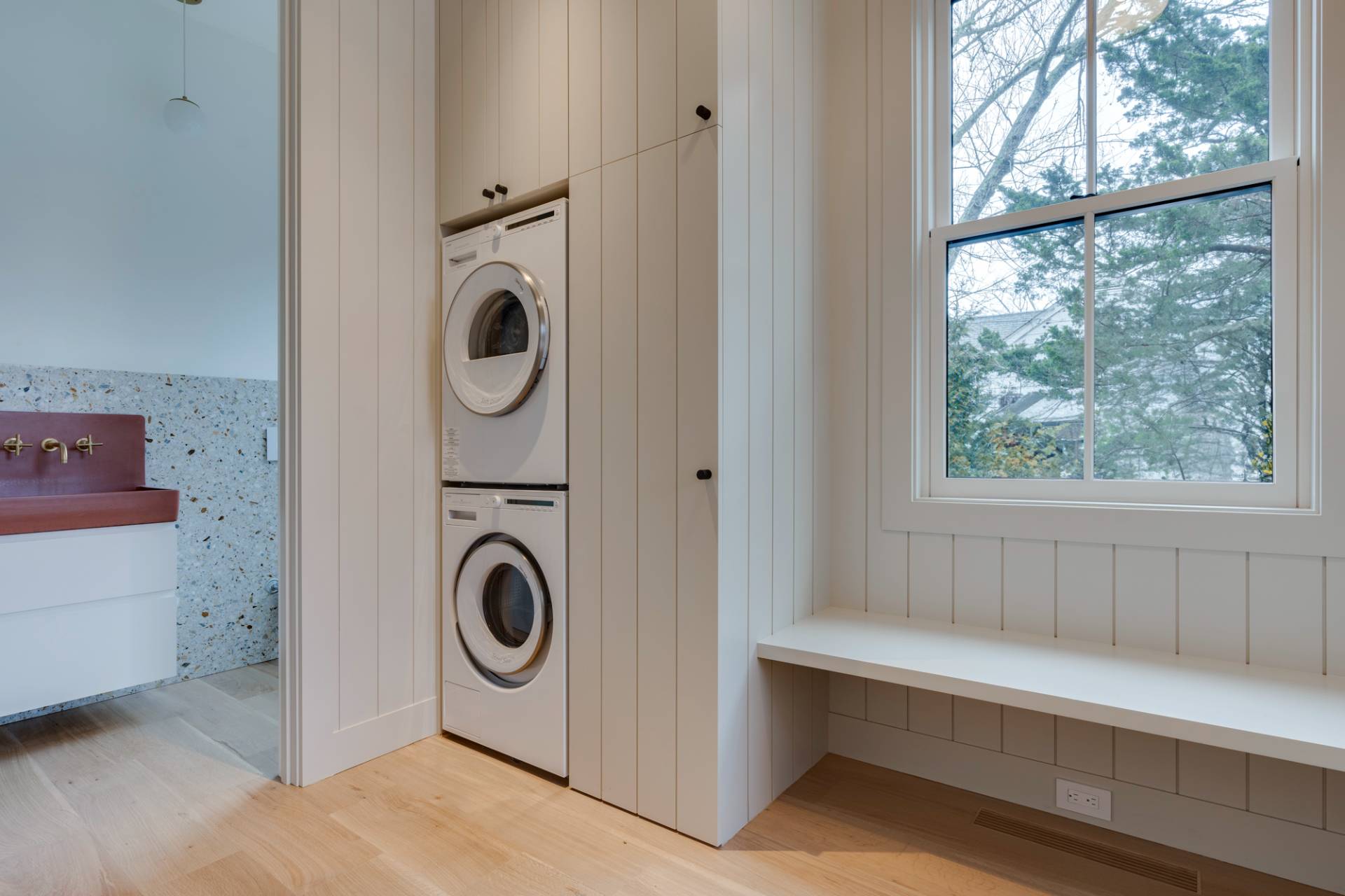 27 Sunset Road Sag Harbor, NY 11963 - Photo 19 of 45 a utility room with sink dryer and washer
