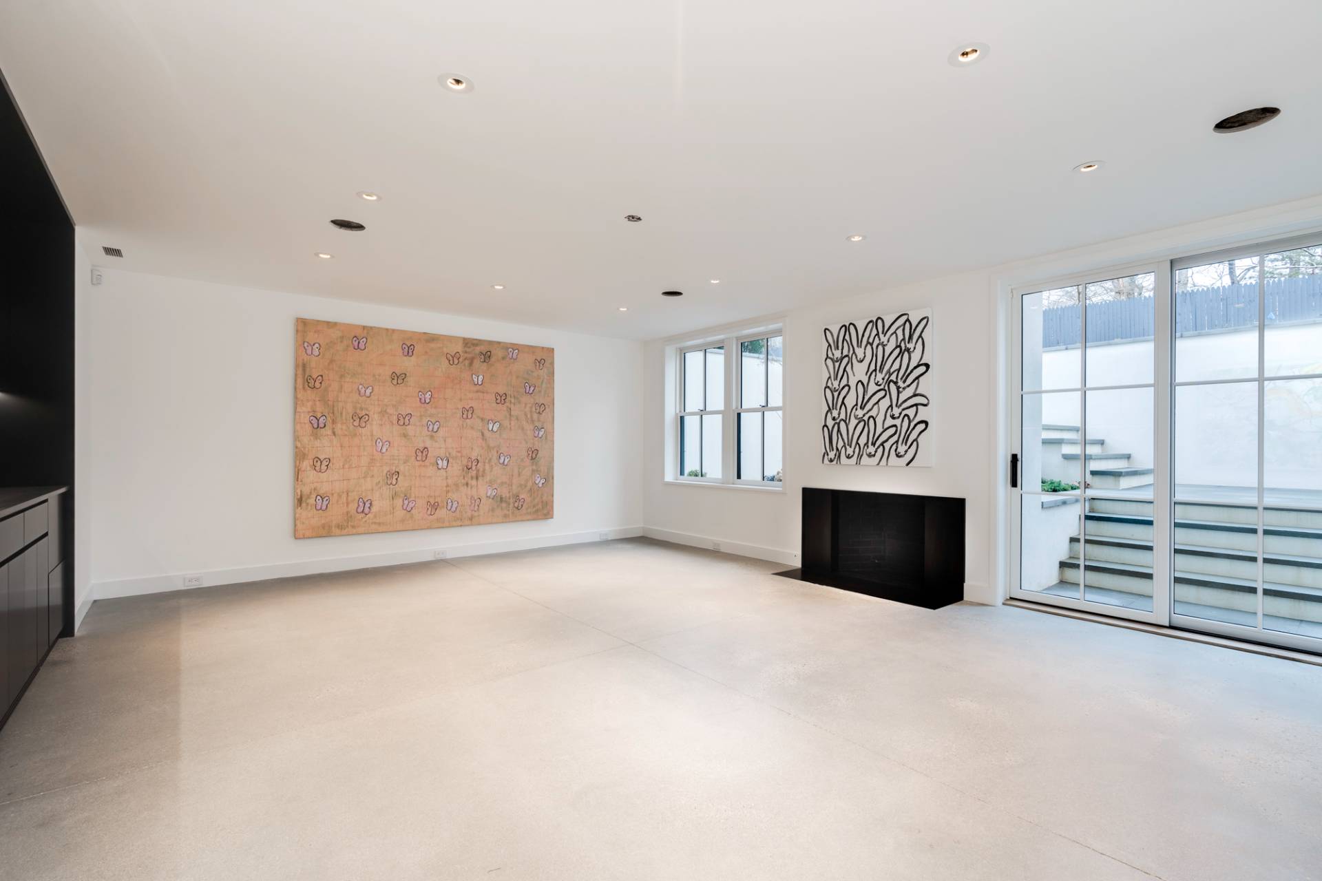 27 Sunset Road Sag Harbor, NY 11963 - Photo 35 of 45 an empty room with furniture and windows