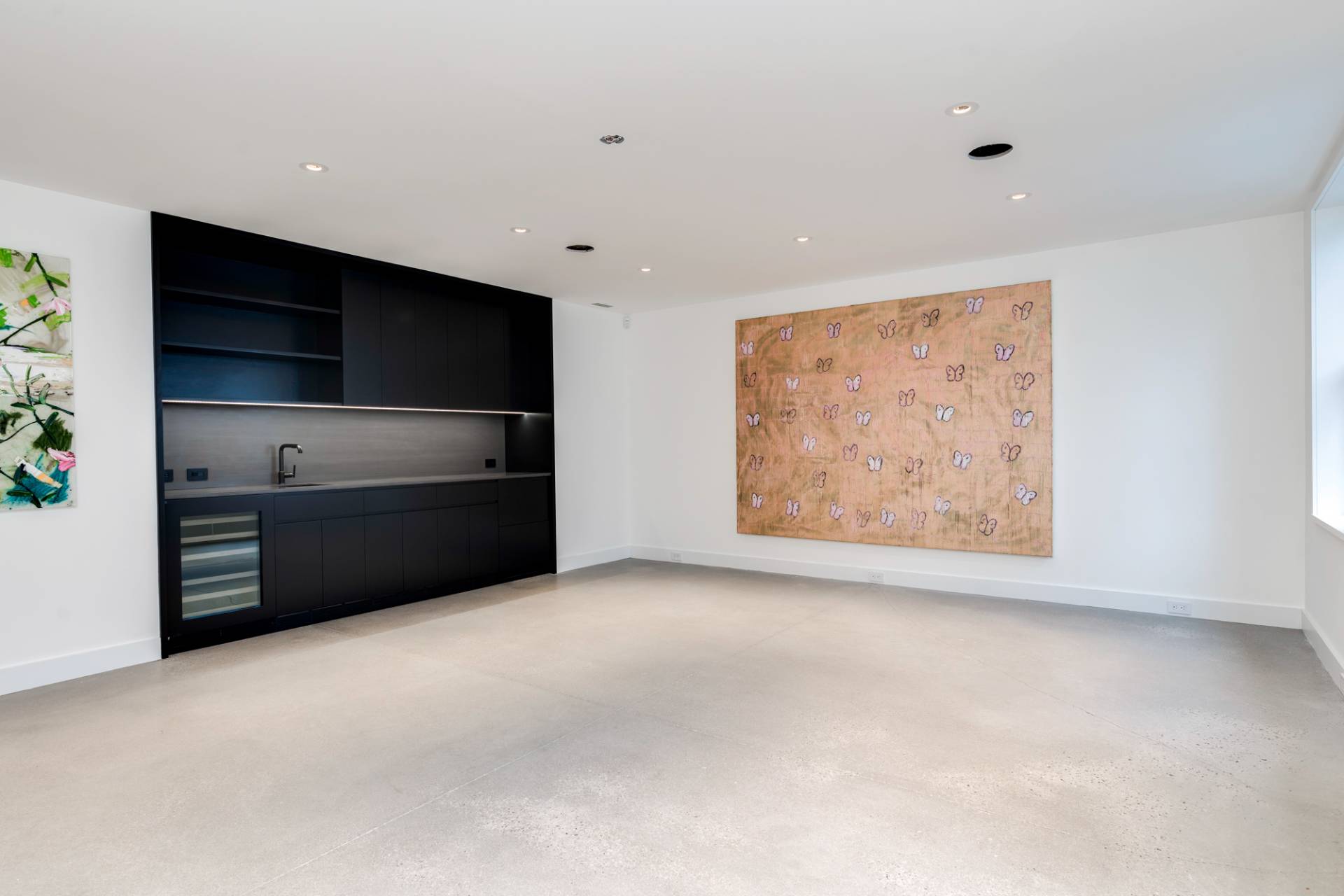 27 Sunset Road Sag Harbor, NY 11963 - Photo 36 of 45 a view of an empty room with a kitchen