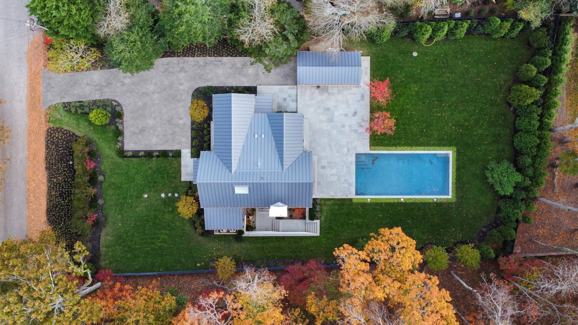 27 Sunset Road Sag Harbor, NY 11963 - Photo 41 of 45 an aerial view of a house with a yard and a large tree