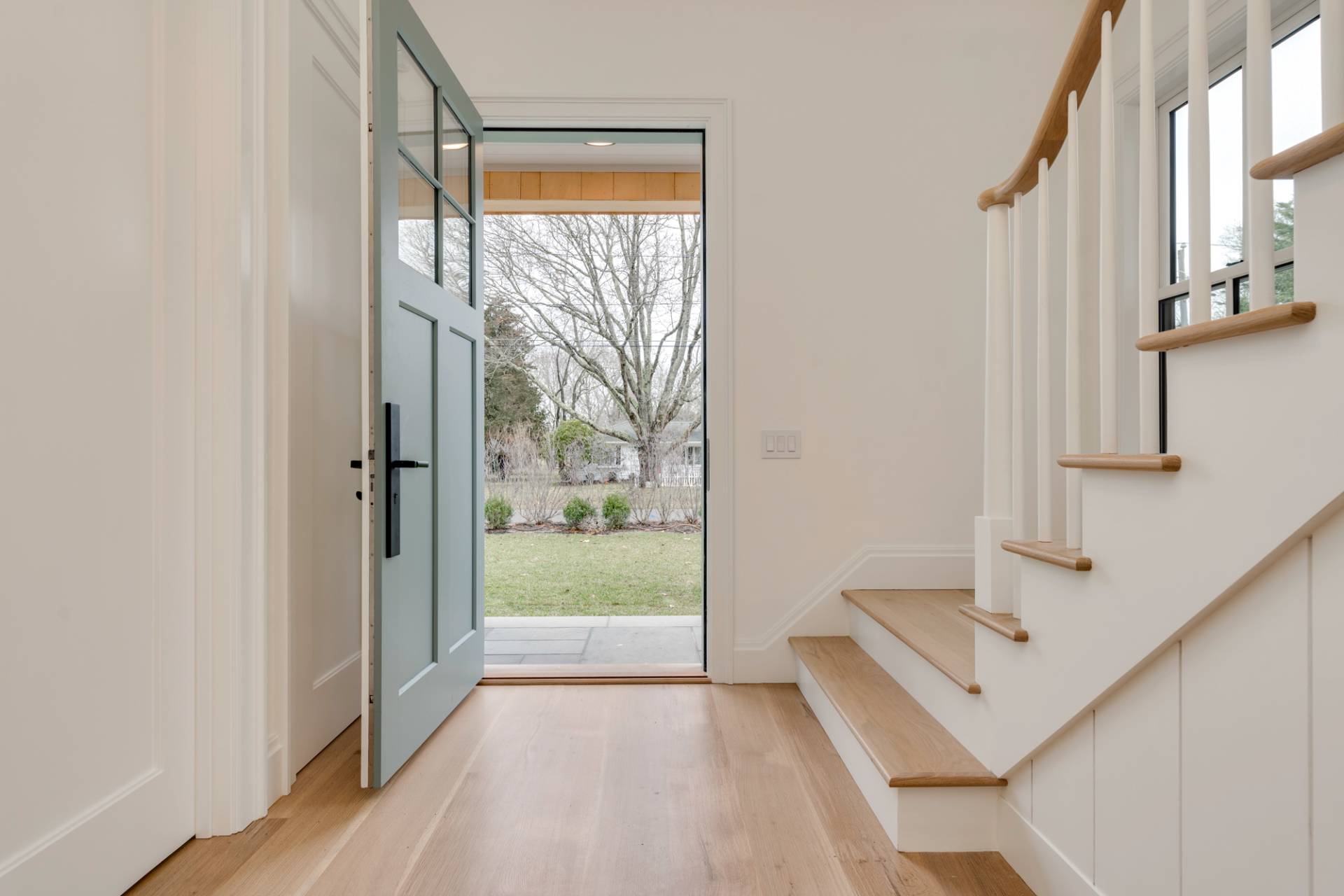 27 Sunset Road Sag Harbor, NY 11963 - Photo 8 of 45 a view of a hallway with a bathroom and a sink