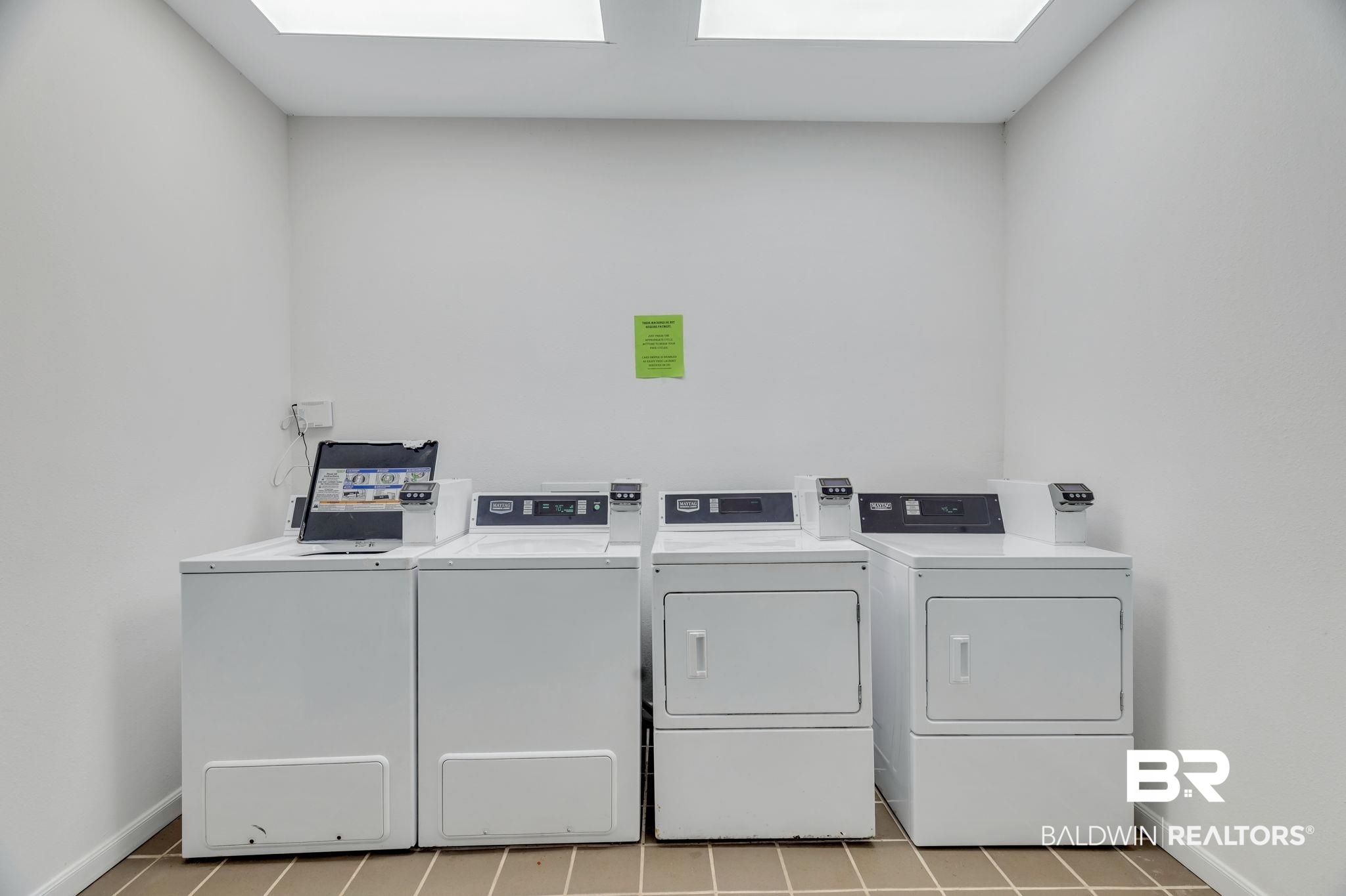 400 Plantation Road, Unit 4115 Gulf Shores, AL 36542 - Photo 47 of 48 Washroom with a skylight and washer and dryer