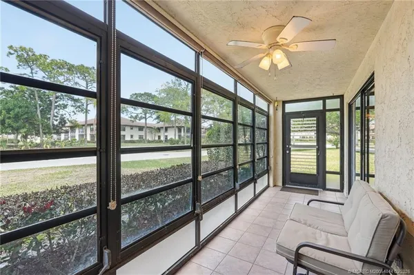 a view of a park with swings and slides