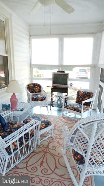 7200 Highbridge Road Bowie, MD 20720 - Photo 13 of 26 Screened Porch Adjacent to Dining Room