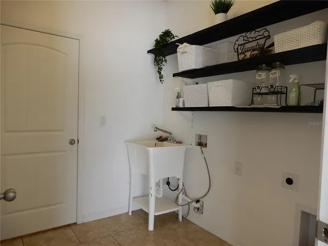 a room with cabinets and wooden floor
