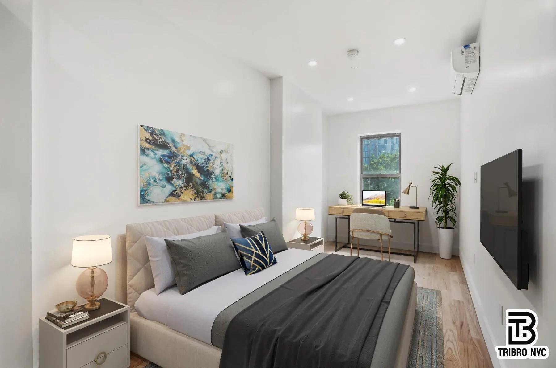 1112 Fulton Street, Unit 2G Brooklyn, NY 11238 - Photo 3 of 5 a bedroom with furniture and a flat screen tv