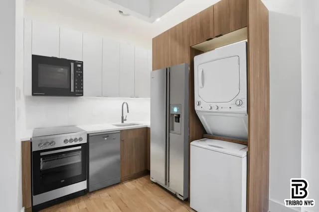 a view of kitchen and washer and dryer