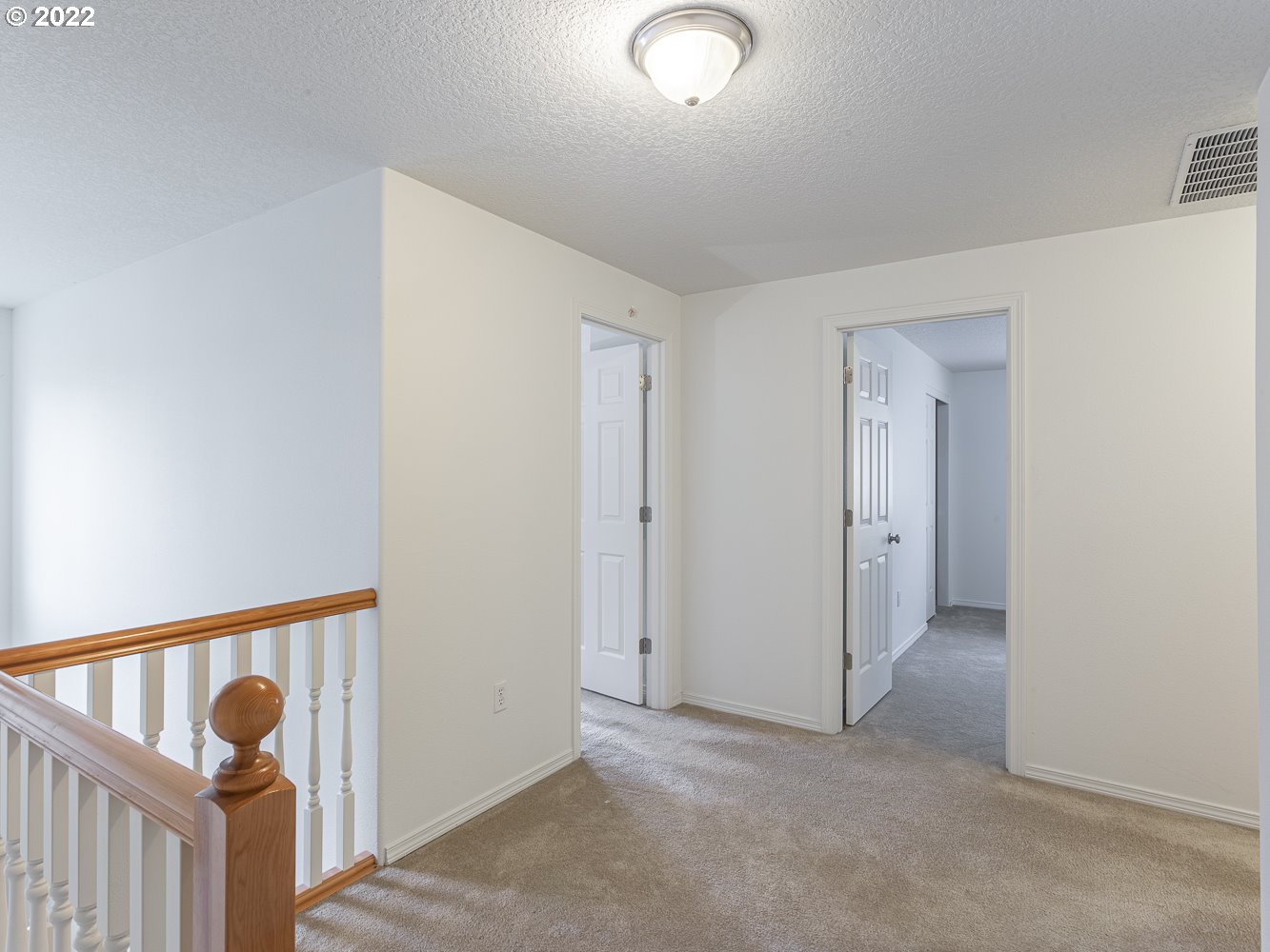 3206 South 2nd Way Ridgefield, WA 98642 - Photo 19 of 32 an empty room with a hallway