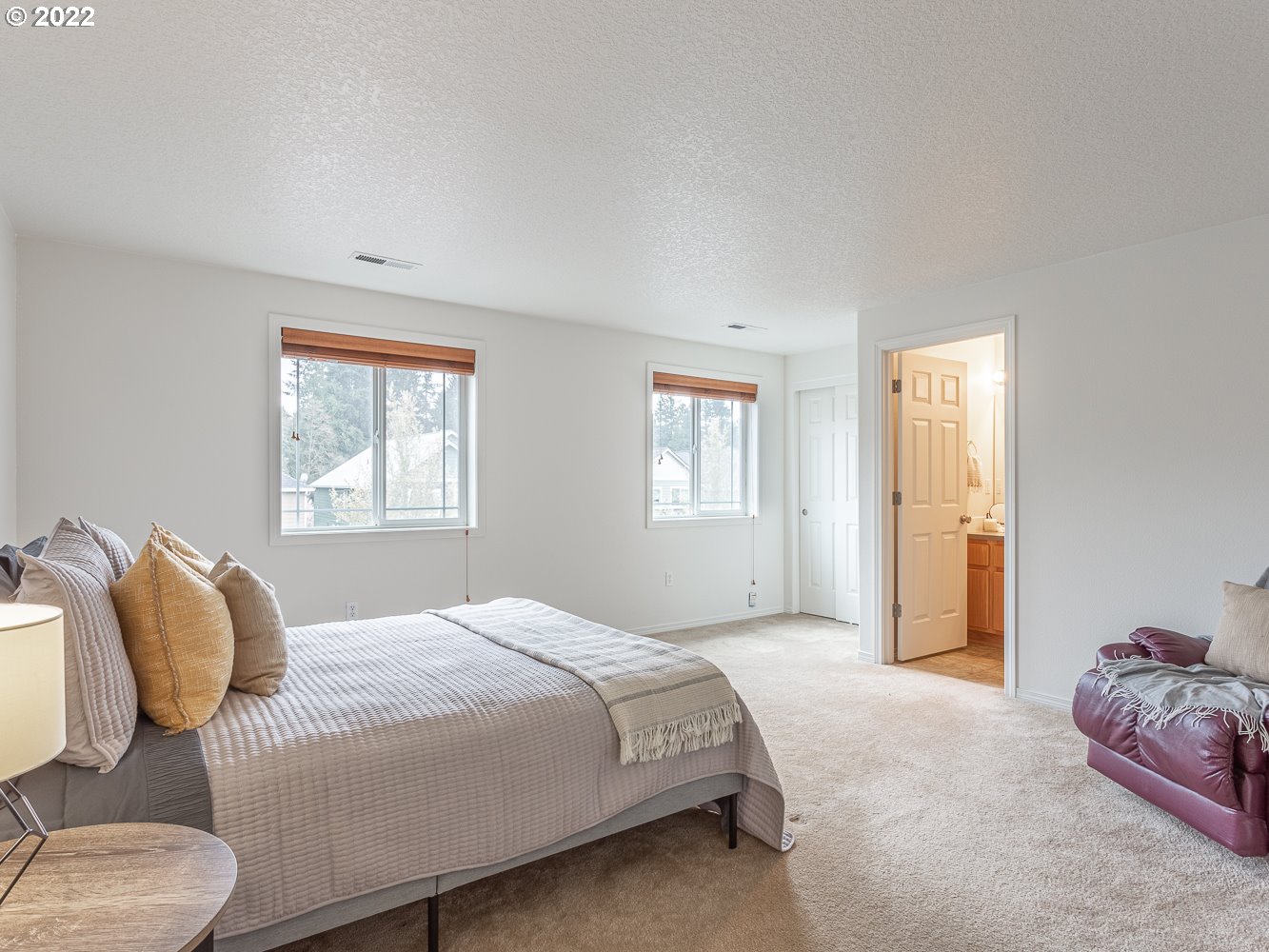 3206 South 2nd Way Ridgefield, WA 98642 - Photo 20 of 32 a bedroom with a bed and window