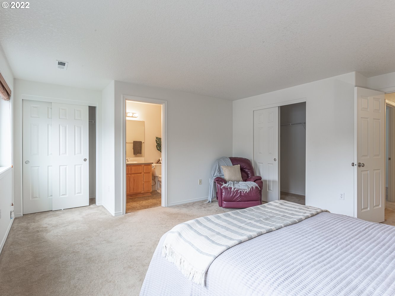 3206 South 2nd Way Ridgefield, WA 98642 - Photo 22 of 32 a bedroom with a bed and a closet