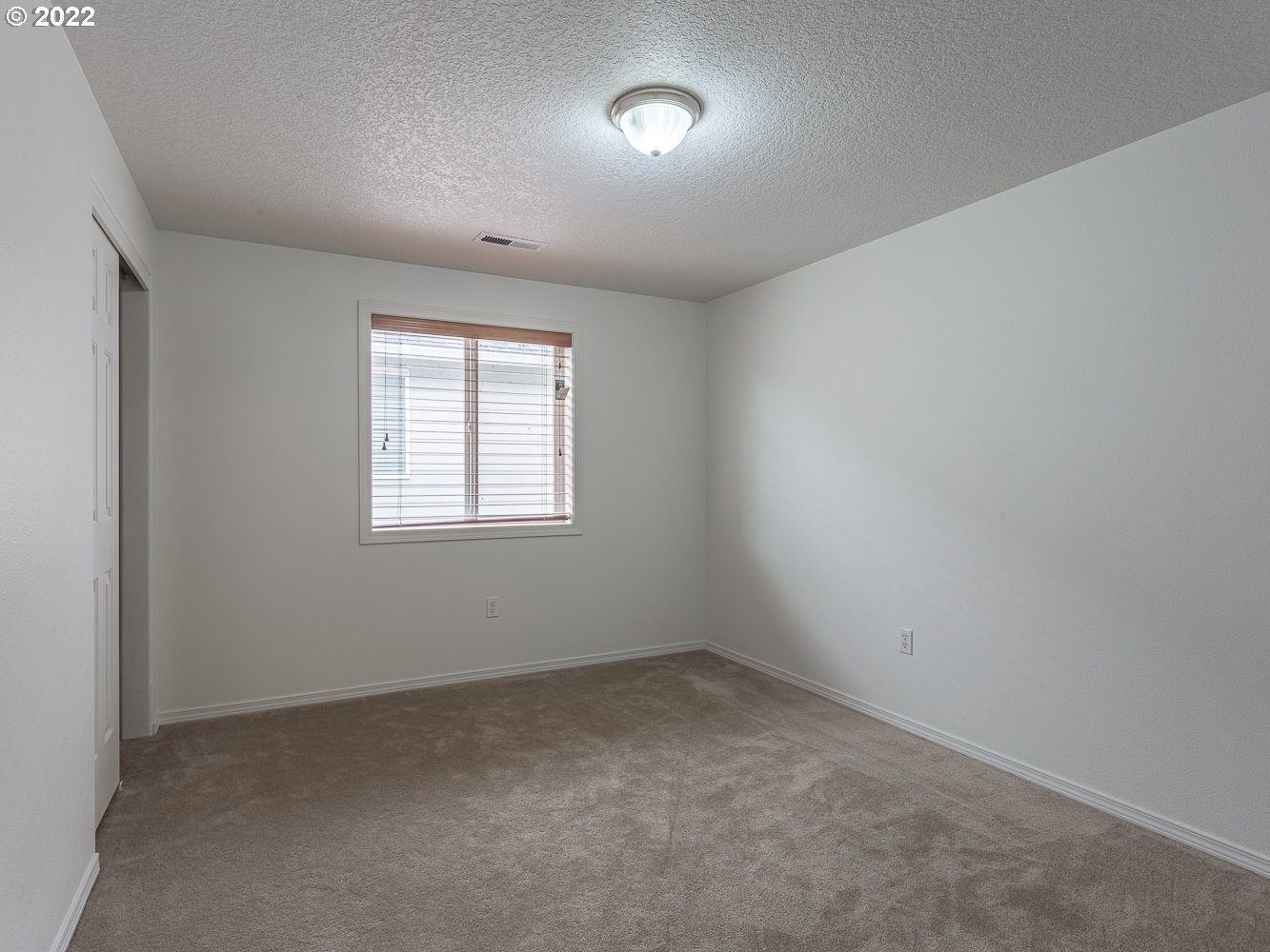 3206 South 2nd Way Ridgefield, WA 98642 - Photo 24 of 32 an empty room with a window