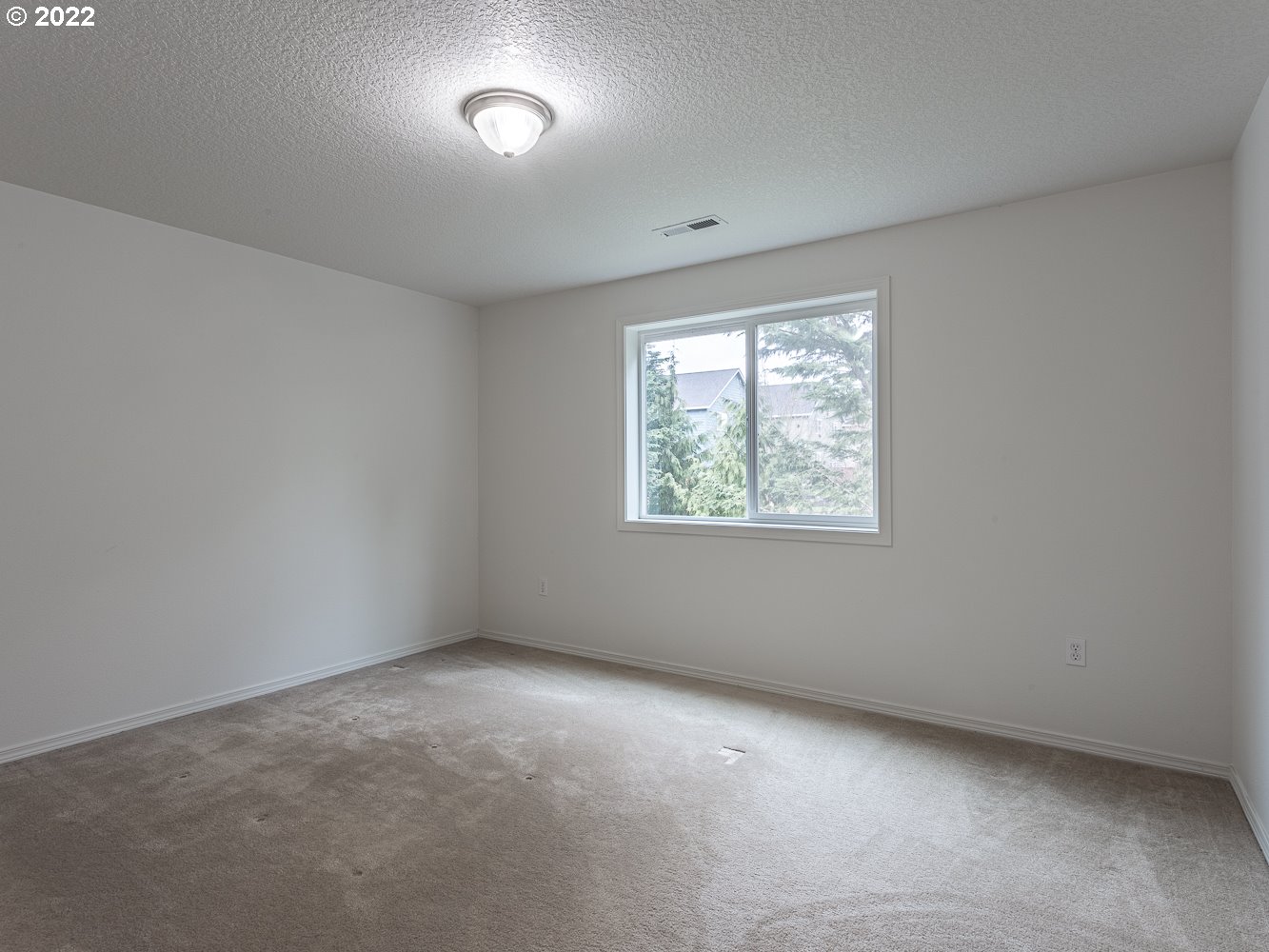 3206 South 2nd Way Ridgefield, WA 98642 - Photo 26 of 32 an empty room with a window