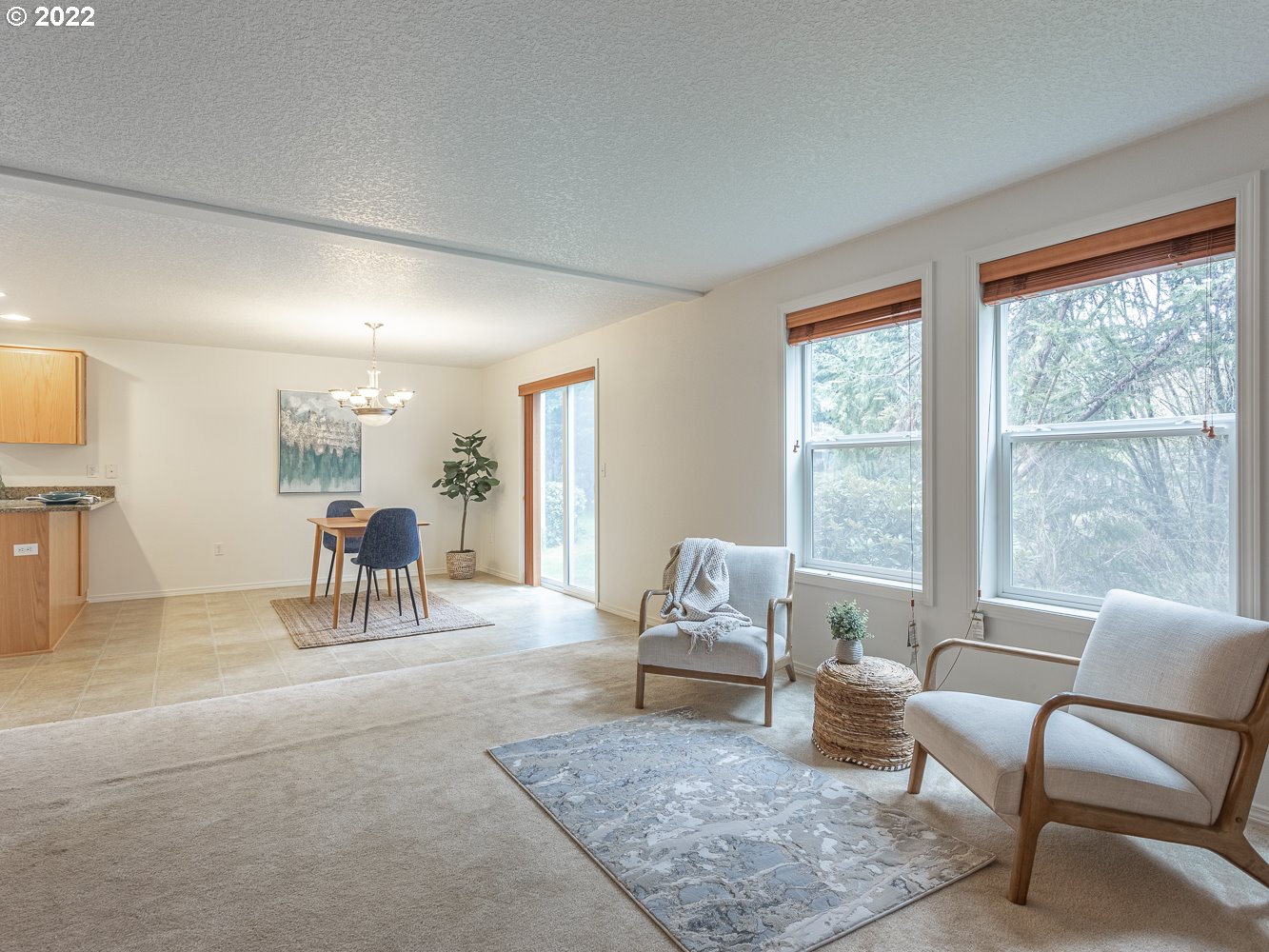 3206 South 2nd Way Ridgefield, WA 98642 - Photo 6 of 32 a living room with furniture and a large window