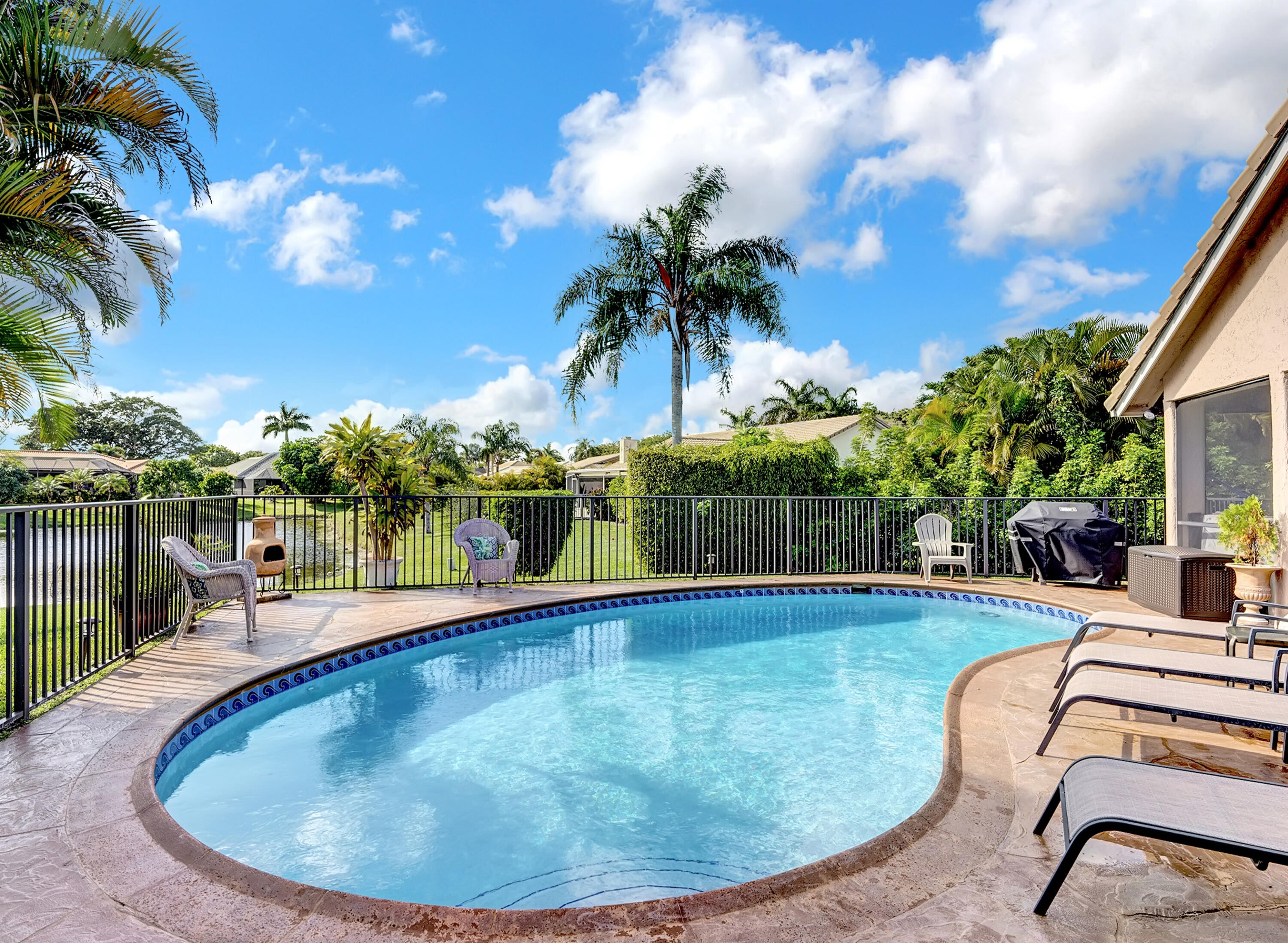 10211 Crosswind Road Boca Raton, FL 33498 - Photo 32 of 43 10211-Crosswind-Rd-pool-view-Jimmy-Middl