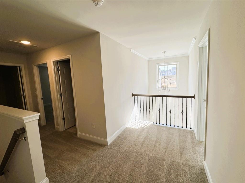 2180 Highridge Point Drive Lithia Springs, GA 30122 - Photo 14 of 24 a view of a room with a hallway